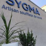 SYGMA - Enseigne